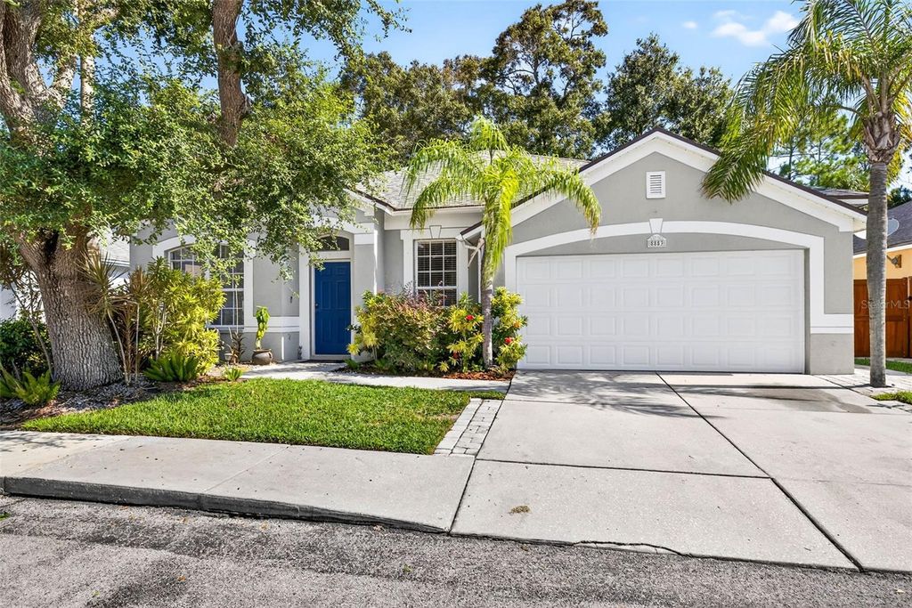 Photo of 8853 Cypress Hammock Drive, Tampa, FL 33614 (MLS # TB8446653)