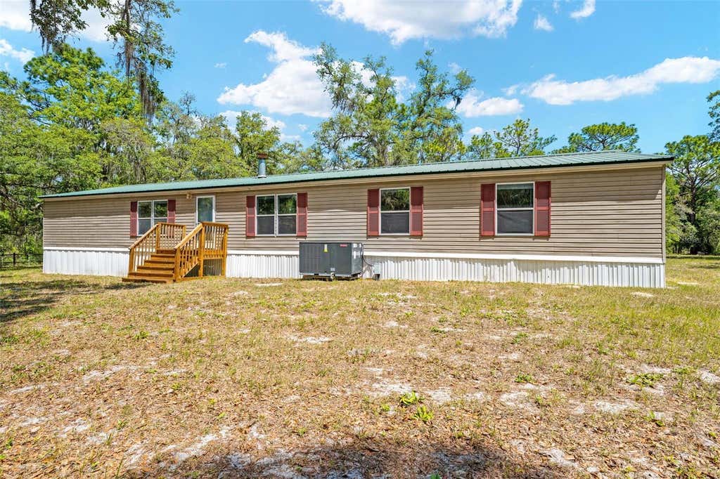Photo of 24503 Evaline Street, Brooksville, FL 34601 (MLS # TB8500656)