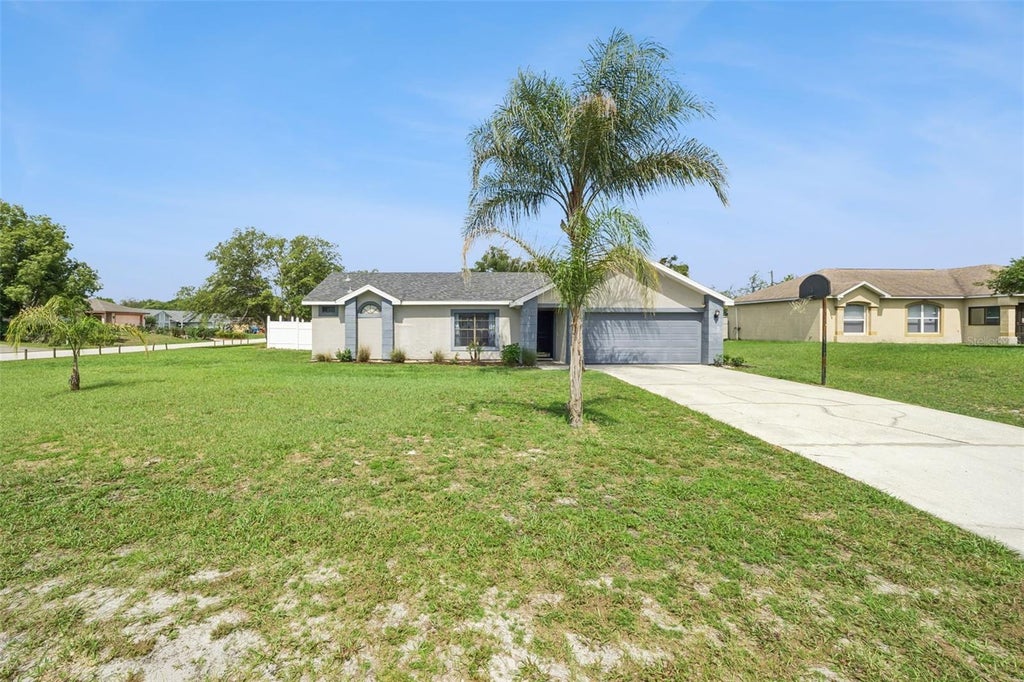 Photo of 2620 E Dorchester Dr, Deltona, FL 32738 (MLS # O6413424)