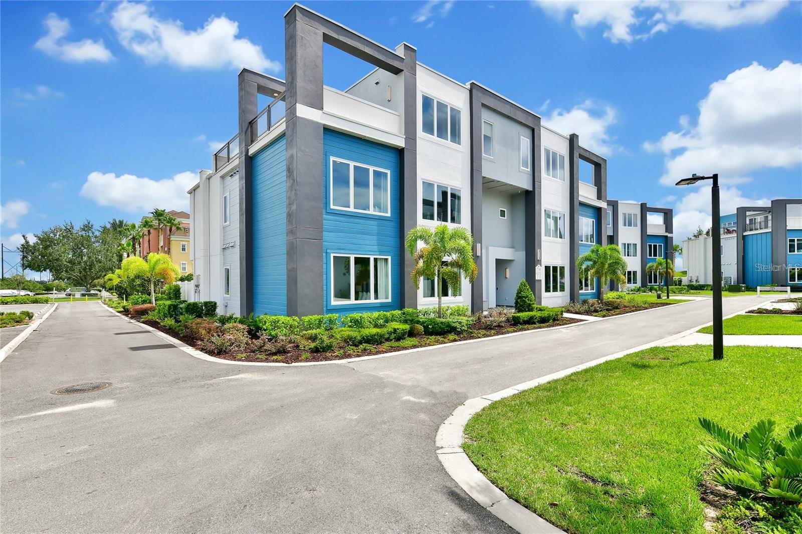 Get ready to start living the Florida lifestyle! Have you visited Florida so much that you thought it may just be easier, and more cost effective to own a home here, well you are right indeed! This fully furnished home is simply that; a place to call home when you visit, and then rented out while you're not here to offset the cost of ownership. Only 5 years young, this two-story condominium is the epitome of modern luxury, with secured access from the ground level, and a convenient elevator location so that you can easily bring your luggage in and out. Do you need extra convenience....how about being one of the closest buildings to the state of the art clubhouse, fitness and pool, only a stone's throw away from your front door! Not only does this make it easier to maximize your time while you're here visiting, but an enticing selling feature for guests who are staying there. Once inside, you can immediately begin to appreciate the design and updates that were thought about during design, including the extra large 36 x 16 tile flooring, timeless decor and art, as well as all of the finishes and hardware that were added. Your primary bedroom is located on the first level, with its own large en-suite bathroom, including dual vanities with plenty of lower cabinetry, as well as a walk-in shower. Two more bedrooms, with a full bathroom in between them (shower & bathtub) are on the first level as well, along with one more bedroom on the same floor. Separate from the first level, and for additional privacy, your fourth bedroom is located on the second floor, with another full bathroom, in addition to a massive sized loft with a new pool table. Do you like to be outside and enjoy the warm Florida sunshine....well check! This home is one of very few who have an outside balcony, accessible from the loft, and is the perfect spot to host those family gatherings and host your holiday parties. Enjoy your morning cappuccino or an evening cabernet while you gaze out onto the blue skies, and make those long last memories with the ones you spend time with. FULLY FURNISHED WITH ALL DECOR, ARTWORK & APPLIANCES | WALK TO THE CLUBHOUSE | OUTSIDE BALCONY | TURNKEY INVESTMENT | Don't you deserve to own a little piece of the sunshine state?