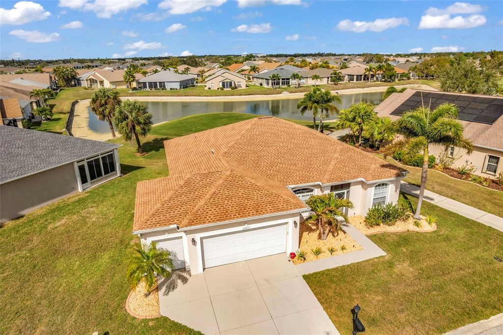 Photo of 24679 Buckingham Way, Port Charlotte, FL 33980 (MLS # C7524270)