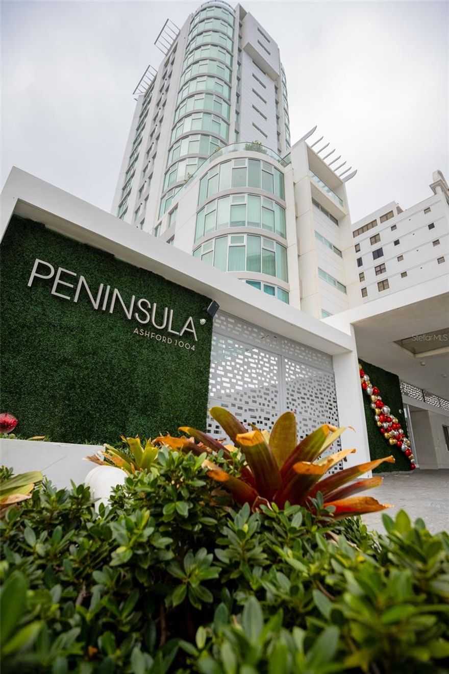 Situated within the sought-after Peninsula Condominium in the heart of Condado, this exceptional full-floor residence offers an unparalleled blend of privacy, modern design, and breathtaking waterfront views. Completed in 2020, the boutique building features only one residence/floor, with private elevator access that opens directly into your expansive 3,909 sq. ft. home.

Designed with a modern, minimalistic aesthetic, the interiors are both elevated and inviting—featuring clean architectural lines, high-quality materials, and a warm, bright ambiance throughout. Floor-to-ceiling windows span the residence, filling the living spaces with natural light while framing panoramic views of the Atlantic Ocean and the Condado Lagoon.

The open-concept layout seamlessly connects the living, dining, and kitchen areas, creating an ideal setting for both everyday living and elegant entertaining. The residence offers four bedrooms and five and a half bathrooms. Originally designed as a five-bedroom home, the layout was thoughtfully reconfigured to create an expansive primary suite featuring dual walk-in closets and spa-like bathrooms. The primary bedroom enjoys stunning ocean views, providing a serene retreat within the home.

A spacious balcony overlooks the Condado Lagoon and passing cruise ships, offering a front-row seat to Puerto Rico’s natural beauty, where manatees can often be seen swimming below. A built-in hot tub on the balcony creates the perfect setting to relax and enjoy spectacular sunset views.

Additional highlights include a home automation system, four assigned parking spaces, and a private storage unit.

Peninsula Condominium provides residents with exceptional amenities including 24-hour security, a resort-style pool, fitness center, activity room, full backup generator, and water cistern, ensuring comfort and peace of mind.

Ideally located in Condado, residents enjoy immediate access to the beach, renowned restaurants, boutique shopping, and the vibrant lifestyle that defines one of San Juan’s most sought-after neighborhoods.
**Currently rented until January 2027.
