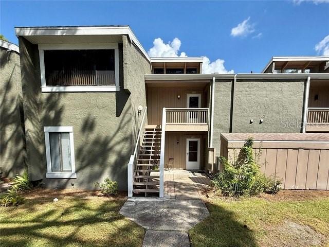 Photo of 6057 Windhover Drive #E-08, Orlando, FL 32819 (MLS # O6446774)