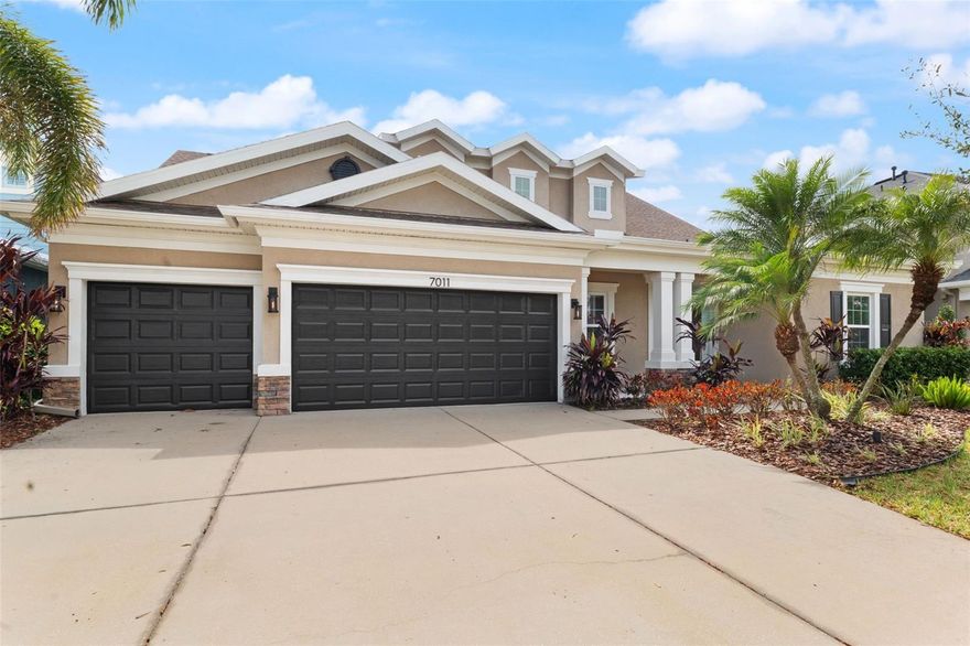 Space, style, and flexibility come together beautifully in this exceptional home located in the highly desirable Waterset community of Apollo Beach. Offering over 3,600 square feet of thoughtfully designed living space, this move-in ready residence features 4 bedrooms, 4 full bathrooms, an office or flex space, a 3-car garage, and a spacious upstairs bonus room that adds incredible versatility. The primary bedroom is on the first floor, making this layout ideal for today’s lifestyle, with soaring ceilings, oversized doors, and elegant architectural details that create a bright, open feel throughout the main living areas. At the heart of the home, the chef’s kitchen anchors the space with beautiful granite countertops, all-wood cabinetry, and a striking glass tile backsplash, all overlooking the living and dining areas—perfect for both entertaining and everyday living. Thoughtful upgrades have recently been completed, including fresh interior and exterior paint along with updated light fixtures and faucets that add a clean, modern touch throughout the home. The owner’s suite is designed as a comfortable retreat with dual vanities, a soaking tub, a large walk-in shower, and a custom walk-through closet that conveniently connects to the laundry room. Upstairs offers even more flexibility with a large bonus room along with a private bedroom and full bathroom—ideal for a guest suite, media room, or a teen retreat. One of the home’s standout features is the seamless indoor-outdoor flow, where triple pocket sliding glass doors open completely to the covered lanai and fully fenced backyard. The yard is ready for the pool you’ve always imagined—picture a resort-style design with a sun shelf, spa, and tropical landscaping creating the ultimate Florida outdoor living space, with a convenient pool bath already in place. Located just a short distance from Waterset’s popular Landing amenities, residents enjoy easy access to the sparkling leisure pool, fitness center, and vibrant neighborhood lifestyle that makes this one of Apollo Beach’s most sought-after communities. For buyers looking for a spacious resale home with quality construction, thoughtful design, and the opportunity to create their dream backyard oasis, this home truly checks all the boxes.