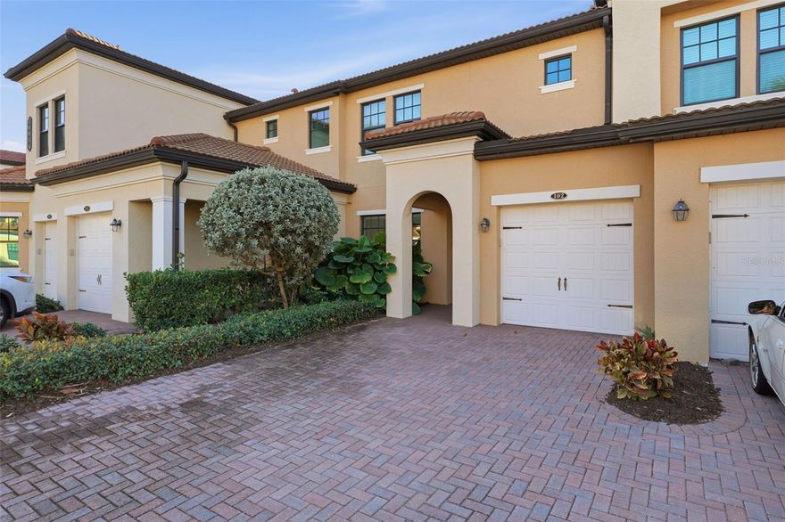Discover elevated Florida living in this impeccably maintained 2-bedroom, 2-bath townhome located in the prestigious gated community of Sarasota National and just about 10-15 minutes from the pristine Gulf coast beaches.  This thoughtfully curated open floor plan is designed for elegant entertaining and comfort.  The kitchen features quartz countertops, stainless steel appliances, a large island for entertaining and a large dining area.  This home is complete with crown molding throughout. Also, has impact-rated windows and sliding glass doors that open to the lanai with a serene pond view.  Kitchen opens to living room for great entertaining and spacious living.  Residents of Sarasota National enjoy access to an exceptional collection of resort style amenities including a championship golf course, elegant clubhouse, state of the art fitness center, spa, tennis and pickleball courts, dog park, bocce courts, tiki bar, coffee room, playground and an array of social and recreational offerings.  This residence represents more than a home-it is a distinguished Florida lifestyle.