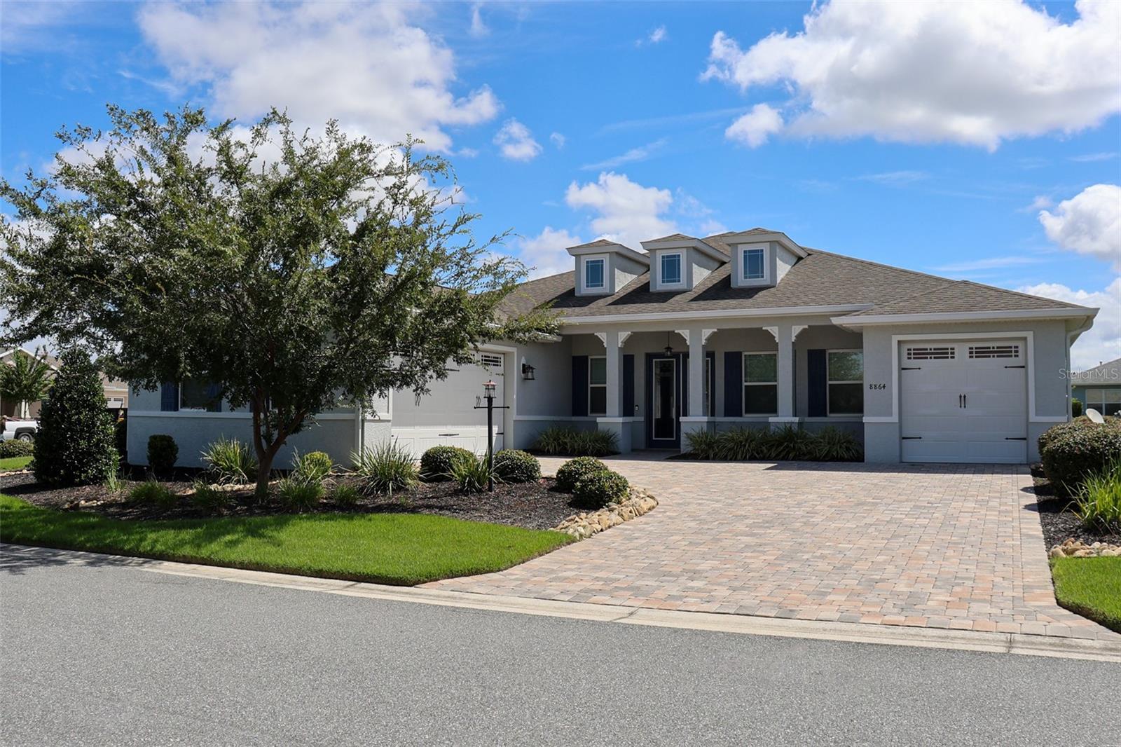 Florida's favorite 55+ community! A great opportunity to add the finishing touches to make this Aberdeen model your own! It features two Primary bedroom suites with full bathrooms and walk-in closets, a third bedroom, a third full bathroom and a media room. The pool is ready for you to relax! Many upgrades have been completed. Located in the quaint area of Candler Hills West, just down the street from "THE LODGE", where the community gathers for music, social events, games and more fun than you could ever ask for! Ocala is home to the World Equestrian Center, 7 natural Springs, and a central location that will lead you to Orlando, Tampa, Gainesville, Daytona for a day trip.
On Top of The World is your dream destination!!