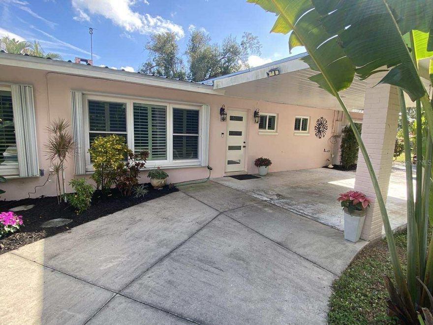 Timeless Punta Gorda Charm — Beautifully Reimagined...
Step into the warmth and character of this lovingly restored 1957 Punta Gorda home, where classic Florida style meets thoughtful modern updates. This beautifully redone 2-bedroom, 2-bath residence sits on a 60 x 200 foot lot framed by mature, tropical landscaping that immediately sets a welcoming tone.
Inside, original terrazzo floors gleam throughout, complemented by abundant natural light pouring in through brand-new windows dressed in elegant plantation shutters. The home’s layout feels open and inviting, offering comfortable living and dining spaces perfect for both everyday enjoyment and entertaining.
A durable metal roof adds long-term peace of mind, while the mostly updated home provide a clean, refreshed feel that blends seamlessly with the home’s vintage charm. Outdoors, the private backyard is a serene retreat featuring a cozy fire pit — ideal for evening gatherings, morning coffee, or quiet relaxation under the Florida sky. The yard is fenced in the rear and has a double gate to put a camper or motorhome should you need additional storage for one.  There is also a shed. 
Additional highlights include a covered carport, easy indoor-outdoor flow, and a beautiful yard with plenty of room for additional gardening or future enhancements. Located in desirable Cleveland area of Punta Gorda, close to downtown, waterfront parks, dining, and shopping, this home is truly move-in ready and a rare find.
A true must-see — classic, comfortable, and full of that old Florida charm.