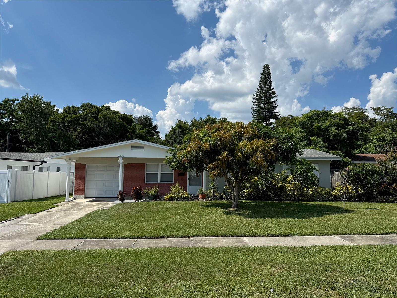 Welcome to this charming 3-bedroom, 1.5-bath single family home in East Orlando! This well-maintained property features a beautifully updated kitchen and bathroom, tile flooring throughout, and a spacious layout. Enjoy Florida living with a large fenced backyard that backs up to a peaceful conservation area and your own private in-ground pool.
Pool and lawn maintenance are included in the rent, making this home easy to care for. Conveniently located near shopping, dining, major highways, and UCF.
Don’t miss out—schedule your showing today!