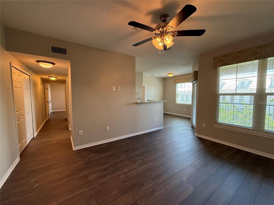 The Quarter at Ybor is known for its vibrant location, and this particular unit offers one of the best setups in the entire community. Situated as a highly desirable top-floor end unit, it delivers maximum privacy with no neighbors living above you and only one shared wall. Adding to its premier location, the main resort-style pool and hot tub are located right outside your door, making it feel like a private oasis. Inside, the entire space has been beautifully refreshed with brand-new flooring throughout, alongside fully updated bathrooms and a modernized kitchen that is completely move-in ready. The resort-style community amenities are second to none, featuring two sparkling pools, a relaxing spa, a fully equipped gym, and beautifully landscaped courtyards. For entertainment and socializing, the impressive club room comes complete with a full kitchen, a private movie room, and game area. Peace of mind and convenience are also paramount in this gated community, which features a secured parking garage where this unit boasts two dedicated, reserved parking spots—a premium luxury for the area. Location is everything, and this condo places you right in the heart of historic Ybor City, steps away from legendary dining, nightlife, and entertainment. For commuters, the location is unbeatable, offering immediate and convenient access to I-4, I-275, and the Selmon Expressway, putting downtown Tampa, the Channel District, and the surrounding bay area just minutes away. Whether you are looking for a turnkey primary residence or a stellar investment property in a high-demand market, this updated gem offers the perfect blend of historic charm, modern updates, and resort-style convenience.