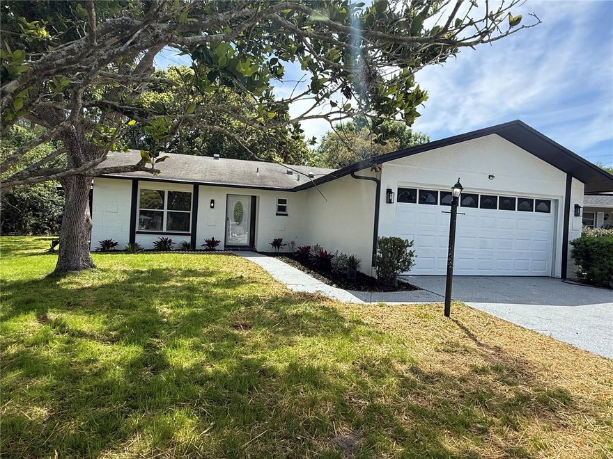 Stunningly Remodeled 3/2 Cul-de-sac Gem in Premier 55+ Timber Oaks!
Discover the perfect blend of modern luxury and active adult living at 10501 Hardwood Ct, Port Richey! This meticulously updated 3-bedroom, 2-full bath home is nestled on a quiet, private cul-de-sac, offering peace and serenity with only one neighbor on one side, surrounded by mature trees. Step inside to discover a bright, open interior featuring brand new luxury vinyl flooring throughout, fresh paint, and all-new fixtures. The gourmet kitchen boasts brand-new solid wood cabinets, high-quality quartz countertops, and a sleek, modern finish. Both bathrooms have been completely updated with stylish tiling and new vanities with stone tops. The 2-car garage features brand-new durable epoxy flooring. Relax on your tiled, screened-in porch, protected by metal storm rollers for peace of mind. Located in the highly desirable Timber Oaks 55+ community, enjoy an abundance of activities, a vibrant clubhouse, and heated pool, all with a low monthly fee of just $55! shopping & Dining: You are minutes from major shopping centers like the Gulf View Square Mall and a variety of waterfront dining options, are endless.
Regional Access: Located Between Ridge Road and State Road 52 short drive to US Hwy 19, you have an easy access to near by cities and towns. This home is waiting for you—schedule your tour today!