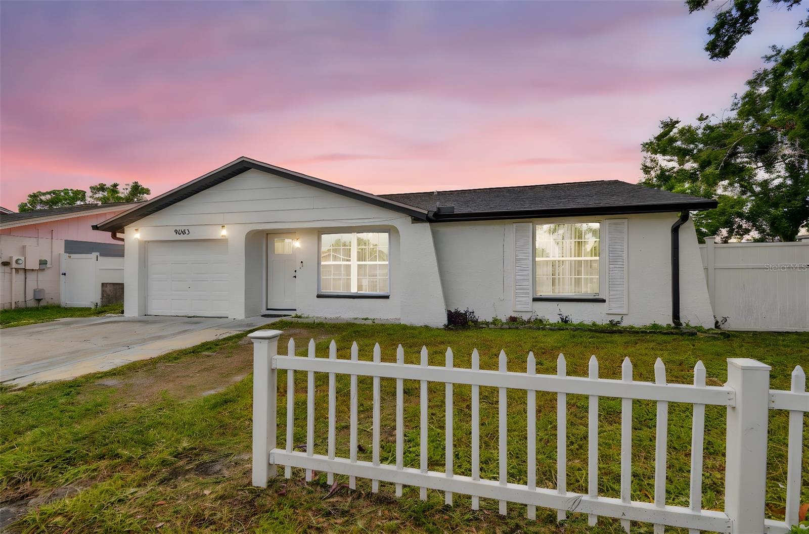 Welcome to this move-in-ready 3-bedroom, 2-bathroom ranch-style home in the heart of Tampa Bay, featuring solid block construction and a newly updated kitchen with modern appliances and solid wood cabinets. Stylish tile flooring flows throughout the interior, while the remodeled bathrooms add a fresh touch. Enjoy the convenience of an indoor laundry area and a spacious 10'x23' attached garage for parking and storage. The fully fenced yard offers privacy with a vinyl fence and charming front picket fence, plus a brand-new screened back porch perfect for entertaining. Located in a no-flood zone and in excellent condition, this home provides easy access to Veterans Expressway, I-275, Tampa International Airport, International Plaza, Westshore Mall, Downtown Tampa, Clearwater, St. Petersburg, and the beaches. Close to top-rated schools, shopping, restaurants, and all the vibrant lifestyle Tampa Bay has to offer.