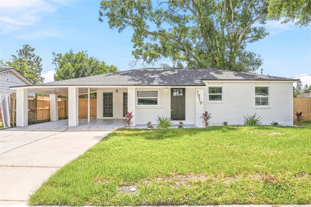 Photo of 7919 Croton Avenue, Tampa, FL 33619 (MLS # TB8552276)