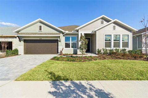 Photo of 31479 Hayman Loop, Wesley Chapel, FL 33545 (MLS # TB8457982)