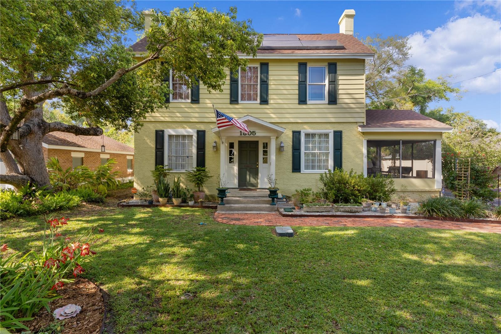 Vintage 1926 home in Eustis!! This 2 story home is the definition of craftmanship from the 1900's. The owners of this home have maintained this home to it's original build. Downstairs are formal living & dining area's with high ceilings, a large gathering area with wood burning fireplace, all with hardwood floors. The kitchen has lots of wood cabinets, corian counter tops, tiled backsplash, stainless steel appliances and door to outdoor living area. There is also a full tiled original bath and 10x7 laundry room with build in ironing board and cabinets. Upstairs is the master suite & 4 additional bedrooms with a large hardwood landing area. The large master bedroom has double closets, along with the 2nd bedroom, the 5th bedroom has a closet, but could also make a great den/office. All of these rooms have hardwood floors. The upstairs bathroom room is tiled clawfoot tub shower. Outside is a beautiful front yard garden area and the backyard has a relaxing 20x20 open wood deck patio area with water feature/koi pond and BBQ area. Owner has replace some of the windows, new roof 2 years ago and newer HVAC units. Owner has also installed solar electric for lower power bills, which is leased and termite bond. There is also an 18X18 covered parking area. You have to see this one for yourself!!