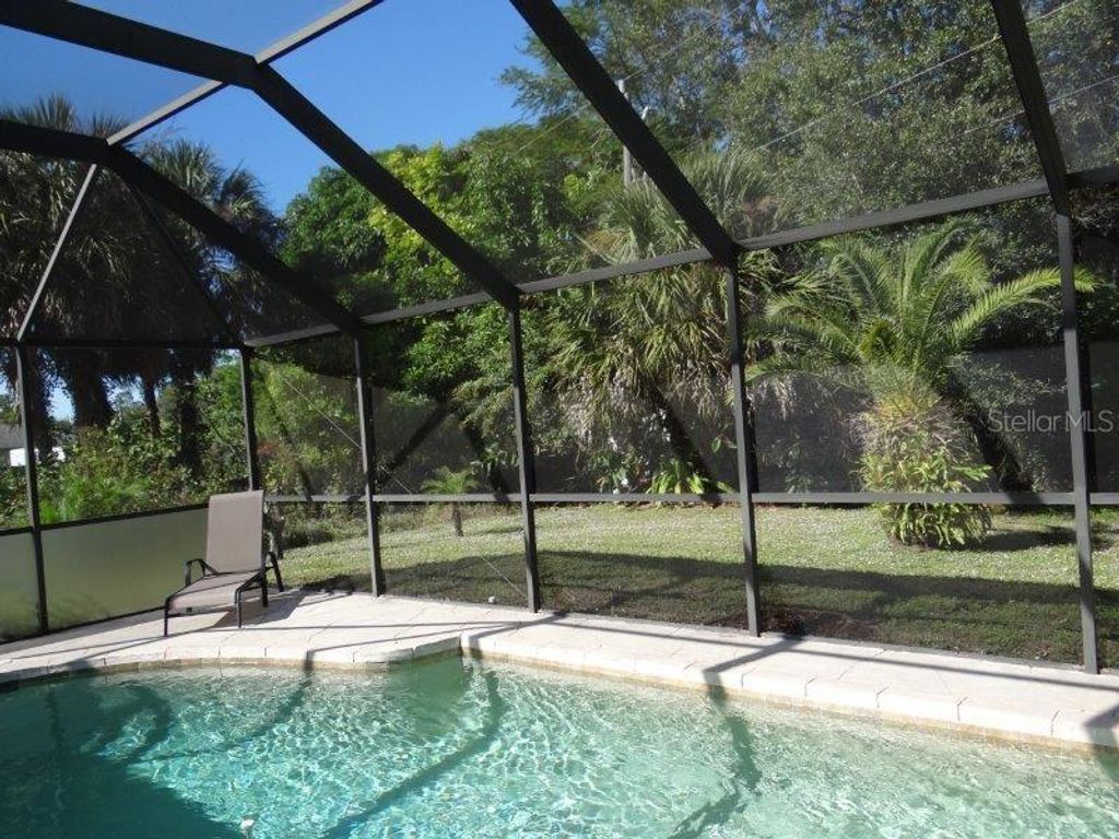 Photo of 1287 Aken Street, Port Charlotte, FL 33952 (MLS # C7509924)