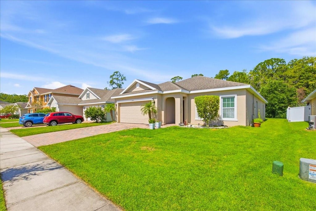 Photo of 2414 Addison Creek Drive, Kissimmee, FL 34758 (MLS # O6429888)