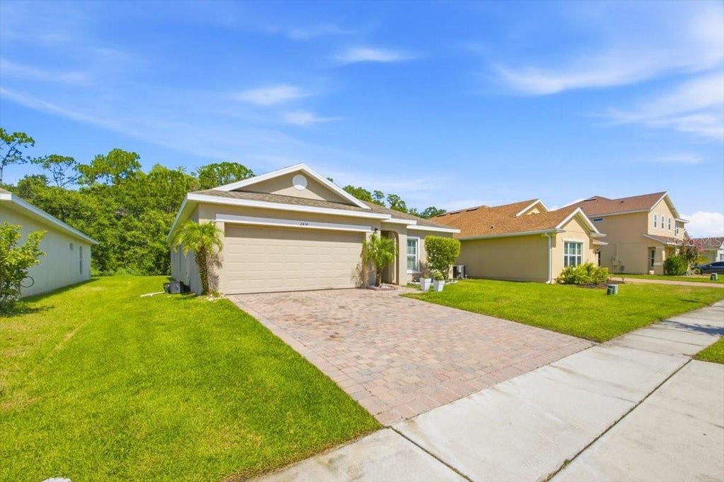 Photo of 2414 Addison Creek Drive, Kissimmee, FL 34758 (MLS # O6429888)