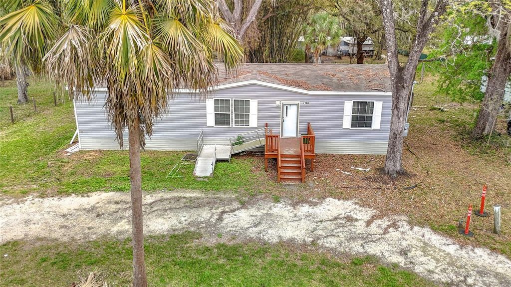 Photo of 7158 Sunnyside Drive, Brooksville, FL 34601 (MLS # TB8484332)