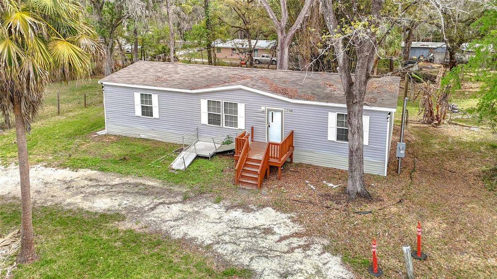 Photo of 7158 Sunnyside Drive, Brooksville, FL 34601 (MLS # TB8484332)