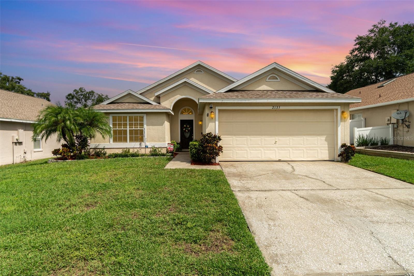 This charming 3-bedroom, 2-bathroom home has spacious, light-filled, and airy rooms that create a welcoming atmosphere throughout. The open layout features an inviting living and dining area, perfect for both relaxing and entertaining. The kitchen offers a cozy eat-in space with stainless steel appliances, ideal for preparing family meals. Ceiling fans in every room ensure comfort year-round, while baseboards throughout the home add a touch of elegance. The master bath has been fully renovated, offering a luxurious retreat, and the entire home features updated flooring, providing a clean and modern look. The home is meticulously maintained, with a newer roof, AC, and water heater, giving you peace of mind for years to come. Step outside to an extended patio that overlooks a fenced yard, perfect for outdoor gatherings or enjoying the Florida sunshine in privacy. The exterior of the home has been freshly painted, and the lush landscaping enhances the curb appeal, making a great first impression. Located in a prime spot, this home is just minutes away from shopping, entertainment, and theme parks. It’s also in close proximity to highly-rated schools and the charming downtown Apopka area. Don’t miss the chance to call this meticulously clean and beautifully updated home your own!