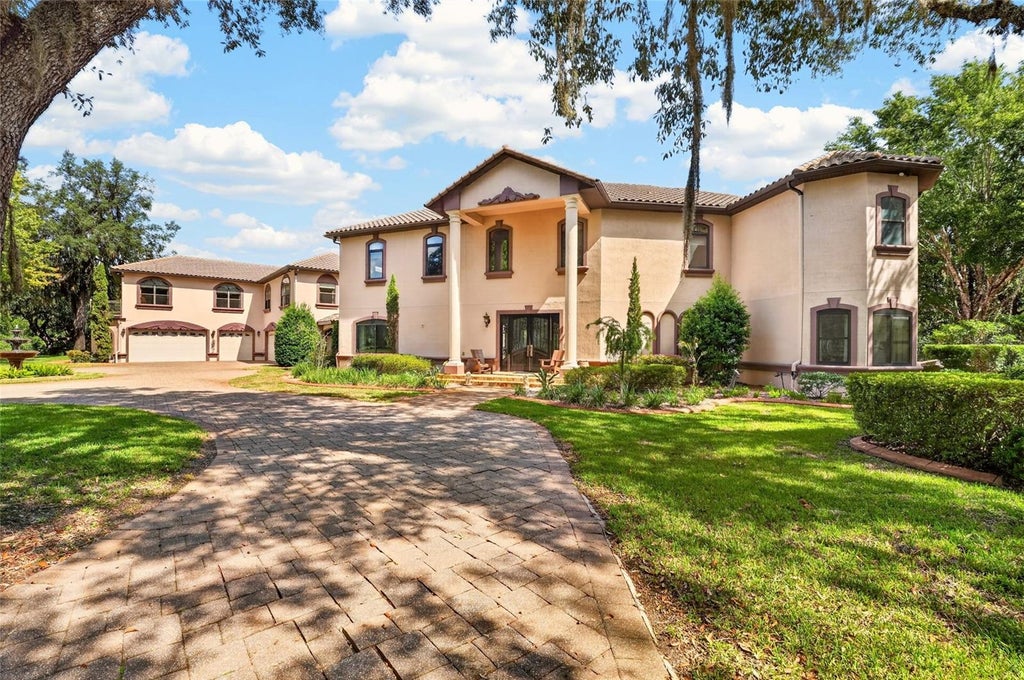 Photo of 130 Hardesty Lake Road, Interlachen, FL 32148 (MLS # OM732942)