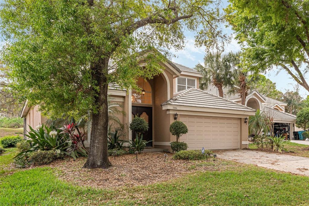 Photo of 7284 Hawksnest Boulevard, Orlando, FL 32835 (MLS # O6396608)