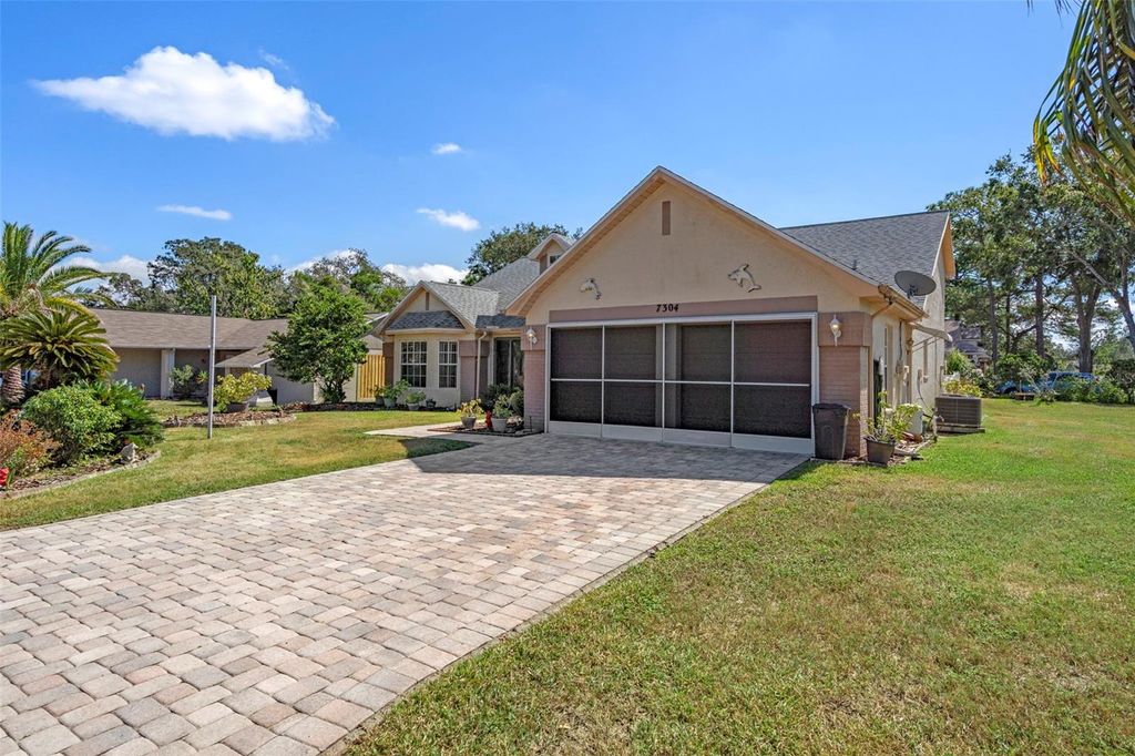 Photo of 7304 Cone Shell Drive, Spring Hill, FL 34607 (MLS # TB8442167)
