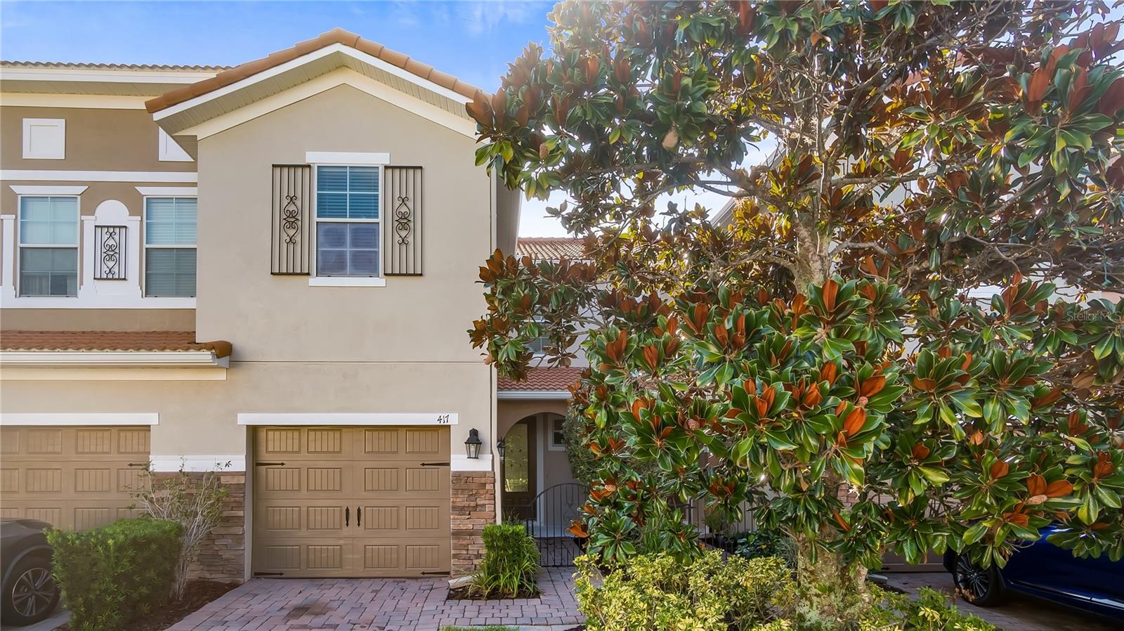 Welcome to this beautiful move-in ready 3-bedroom townhome with a 1-car garage, nestled in the highly sought-after gated community of Terracina at Lake Forest! Enjoy peace of mind and resort-style living with fantastic amenities, including a clubhouse, fitness center, and sparkling pool—all impeccably maintained for your relaxation and enjoyment. This two-story home is designed for convenient living with ceramic tile on the first floor, high-end water-resistant laminate upstairs, and a smart layout featuring 2 full baths upstairs and a half bath downstairs for guests. The modern kitchen features solid surface countertops and is ready for your culinary creations. The spacious primary suite offers a generous walk-in closet and an ensuite bath with dual vanities, separate tub, shower, and private water closet, while bedrooms 2 and 3 share a well-appointed full bath. Outside, enjoy the Mediterranean-style tile roof, charming front courtyard, and screened-in back patio—perfect for Florida evenings. Ideally located just off SR-46 with quick access to I-4, SR-417, and SR-429, plus top restaurants and shopping just minutes away—convenience at its best! This home is vacant and ready for you to move in, make your imprint, and start creating family memories right away.