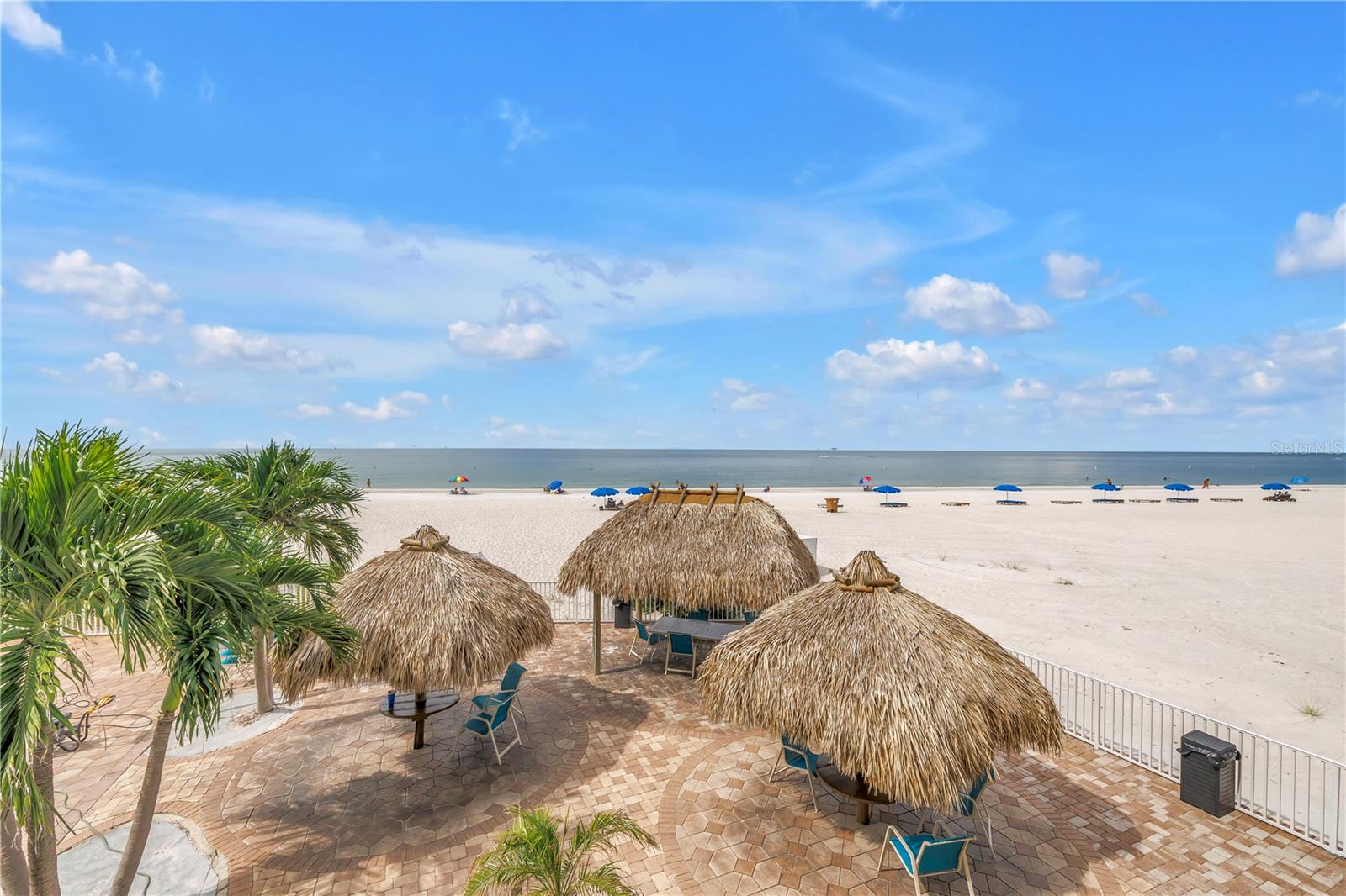 Experience the ultimate Florida beach lifestyle with this exceptional 1-bedroom, 1-bath plus bonus room condo at Sandy Shores in beautiful Madeira Beach. Perfectly positioned with direct Gulf of Mexico frontage, this charming retreat offers breathtaking, unobstructed views and is just steps from the powdery white sands that make Madeira Beach famous. Inside, a large open-plan living area with new engineered hardwood floors flows seamlessly to an integrated dining space and a spacious balcony overlooking the pool and beach, complete with protective hurricane shutters. The stylish kitchen features granite countertops, stainless steel appliances, and crisp white cabinetry, creating a bright and inviting space for entertaining. The extra-large master bedroom boasts new engineered hardwood flooring and an attached bonus bunk room, ideal for children or additional guests. A dedicated parking spot adds convenience, while the prime location—right across from lively John’s Pass with its vibrant shops and restaurants—places endless entertainment at your doorstep. Whether you’re seeking a personal beach getaway or a smart investment, this property delivers with over $70,000 in annual rental revenue potential. Don’t miss your chance to own a slice of paradise and start living your dream Florida Gulf Coast lifestyle!