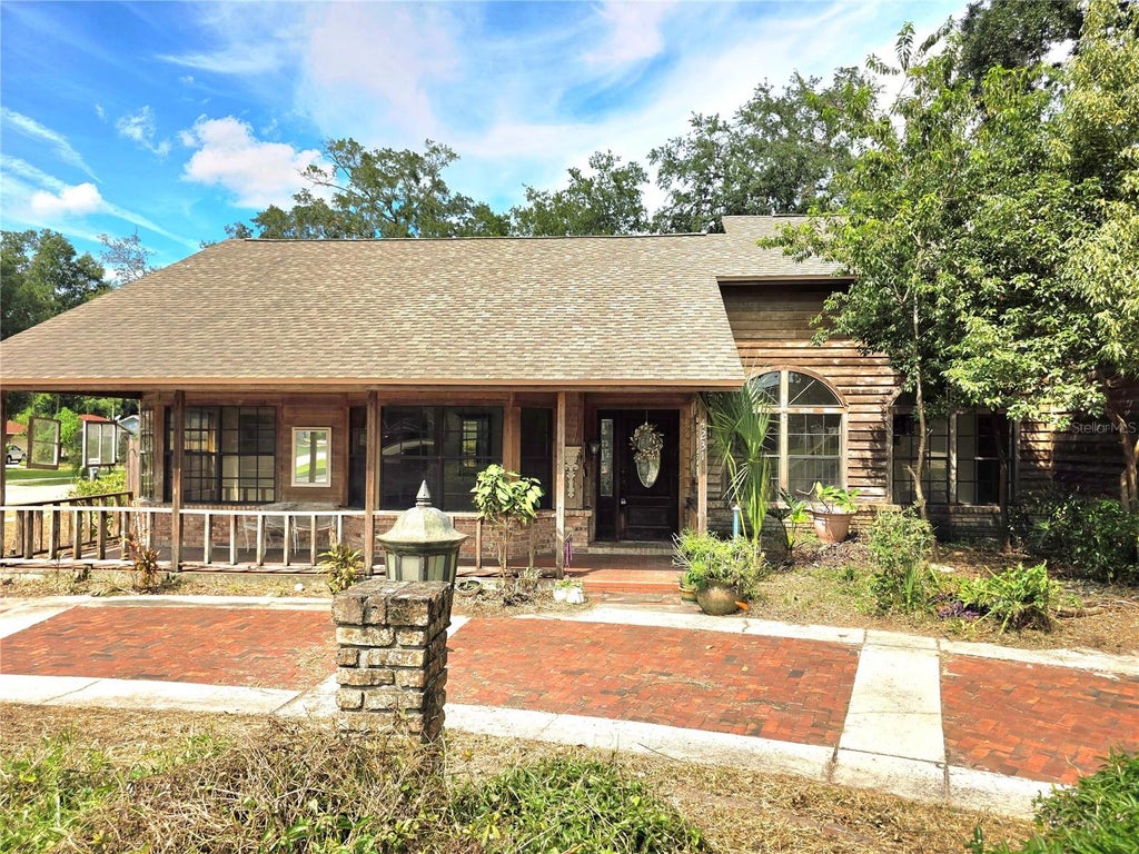 Photo of 4231 Tall Tree Drive, Orlando, FL 32810 (MLS # O6446408)