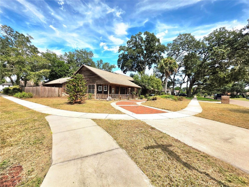 Photo of 4231 Tall Tree Drive, Orlando, FL 32810 (MLS # O6446408)