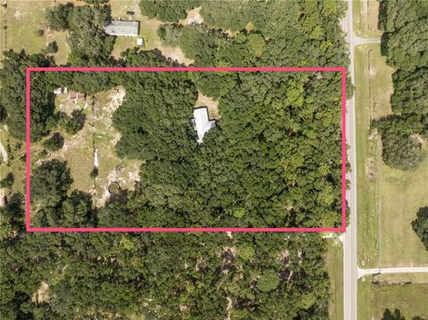 Photo of 2946 SE 21st Avenue, Summerville, FL 33585 (MLS # G5102520)