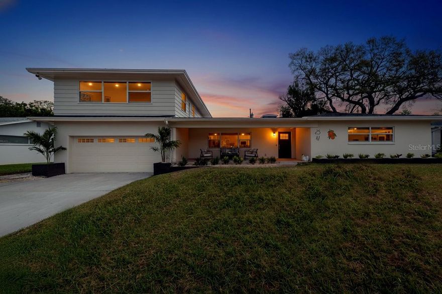 Fully reimagined Fairway Estates home offering over 3,300 sq ft just minutes from Downtown Dunedin, the beach, and the historic Dunedin Golf Club.
4 bedrooms | 4.5 bathrooms | fully renovated | flexible multigenerational living.

Located in one of Dunedin’s most desirable golf-cart-friendly neighborhoods, this completely renovated 4-bedroom, 4.5-bath residence blends classic Florida architecture with a full modern rebuild and is just a short walk to the newly restored Dunedin Golf Club.
Inside, the home offers a rare combination of space, flexibility, and thoughtful design, with each bedroom featuring its own private ensuite bathroom. The layout is ideal for family living, hosting guests, or multigenerational households.
The home has been rebuilt from the inside out with all-new electrical and complete rewire, new HVAC system, new roof, and impact-rated double pane windows, and freshly painted exterior, delivering both modern comfort and long-term peace of mind.
The main living areas showcase beautifully restored polished terrazzo floors throughout the entire first floor, preserving timeless Florida character while complementing the home’s contemporary updates. At the heart of the home is the new open chef’s kitchen featuring quartz countertops, solid wood cabinetry, and a layout designed for both everyday living and entertaining.
One of the home’s most versatile features is the expansive secondary living area currently configured as an in-law suite with its own full kitchen and laundry. This flexible space could easily be adapted into a private guest residence or multigenerational suite with its own entrance, offering exceptional versatility for extended family or evolving household needs, and includes a spacious 360-square-foot bonus living area serves as a second family room and dining space, finished with new luxury vinyl plank flooring and filled with natural light — the perfect flex space for media room, game room, man cave, art studio, or additional entertaining.
Outside, the property continues to impress with a large covered front porch finished with elegant linen tile, an oversized two-car garage, and a fully fenced backyard with new vinyl privacy fencing. The generous lot offers plenty of room to add a pool and create a private outdoor retreat.
Located in Flood Zone X and a non-evacuation zone, the home offers additional peace of mind for coastal buyers while still being just 10 minutes from the beach.
Fairway Estates is one of Dunedin’s most sought-after communities, ideally positioned between the historic Dunedin Golf Club and vibrant Downtown Dunedin. From here you can golf cart to waterfront restaurants, breweries, boutique shopping, festivals, the marina, and farmers markets. Outdoor enthusiasts will also love being just minutes from the Pinellas Trail, Dunedin Causeway, and Honeymoon Island State Park.
A rare opportunity to own a fully renovated, move-in-ready home in one of Dunedin’s most loved neighborhoods.