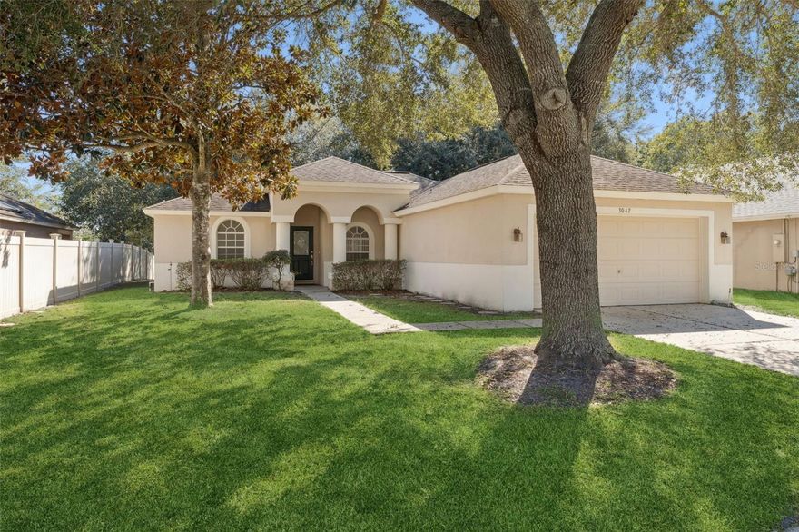 Welcome to 3042 Wild Pepper Ave – Your Peaceful Retreat in Deltona, FL!
Nestled beneath a large, gorgeous shade tree in a quiet neighborhood, this charming single-story ranch-style home offers 3 cozy bedrooms and 2 bathrooms, ideal for comfortable living. The spacious primary suite features a walk-in closet and an en-suite bath complete with dual sinks, a relaxing soaking tub, and a separate shower.
Step inside to a warm and welcoming atmosphere, with large windows that flood the space with natural light and offer tranquil views of the lush greenery outside. Enjoy versatile living areas including a separate formal dining room, a casual dinette, and a spacious living room—perfect for everyday living or entertaining guests. The kitchen is a chef’s delight, featuring 42-inch wood cabinets with crown molding and ample counter space.
Additional highlights include an inside laundry room, a two-car garage, and a partially fenced backyard offering privacy and room to enjoy the outdoors.
Don’t miss this opportunity to own a lovely home filled with timeless charm, modern comfort, and the beauty of a grand tree that welcomes you home.