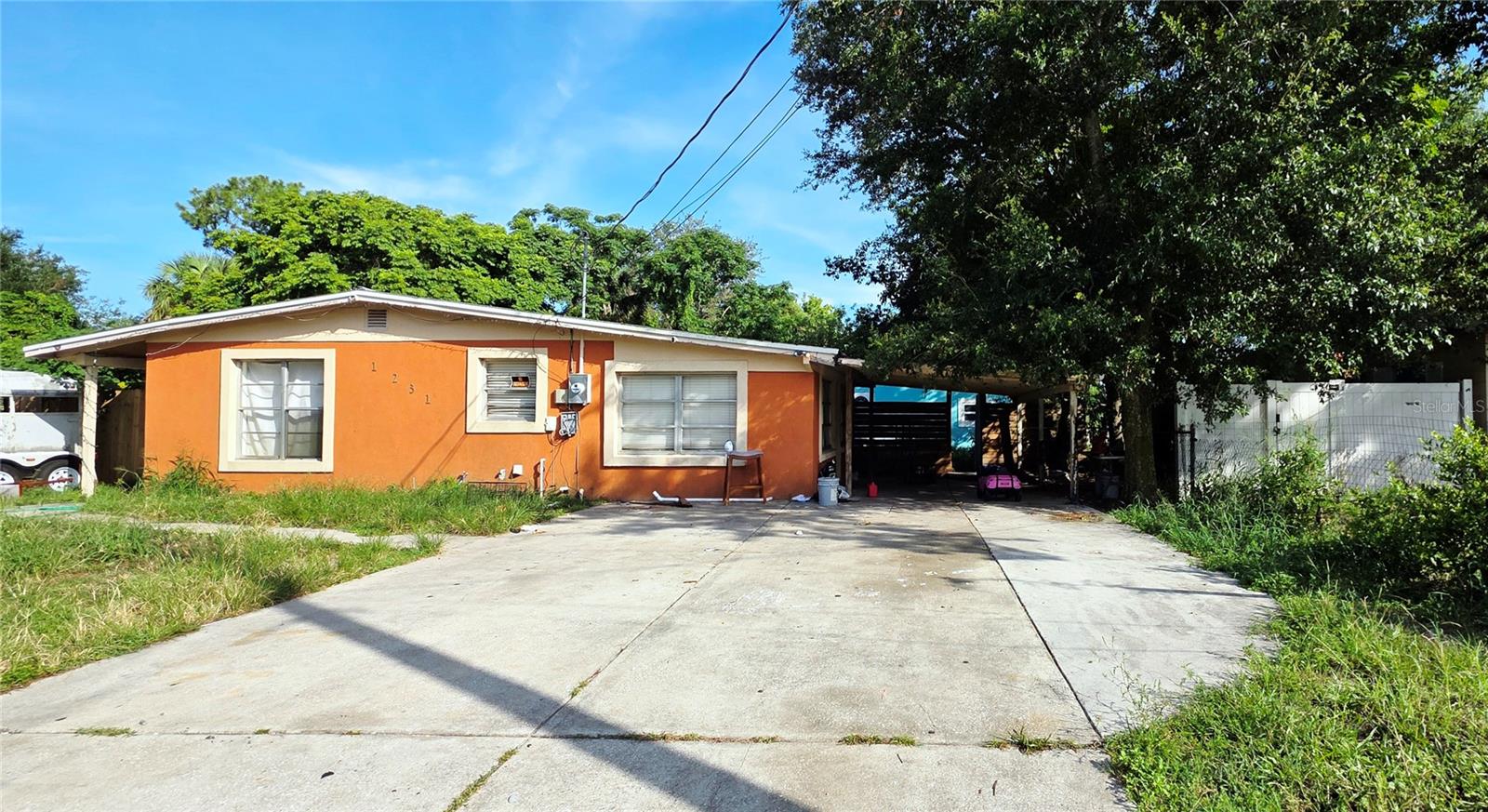 Amazing Investment Opportunity! Welcome to this tenant-occupied, income-producing single-family home offering immediate rental returns. This home comprises of the owner residence and a separate In-Law suite. First home is a 3/2 and the In-Law suite is a separate 1/1 building with full kitchen. Nestled in a quiet residential neighborhood, this well-maintained home offers long-term investment potential with low maintenance needs. Situated in a prime location near shopping, dining, schools, and just 8 minutes from the world-famous Daytona Beach, this property is ideal for investors seeking a turnkey addition to their portfolio. Home is AS IS. Walk in the front door to the living room, kitchen, dining area and laundry, all with an open feel. No HOA!