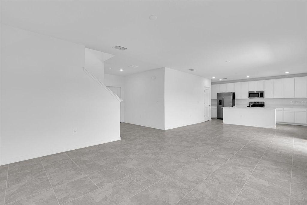 Photo of 1021 Waterfall Boulevard, Davenport, FL 33837 (MLS # O6351299)