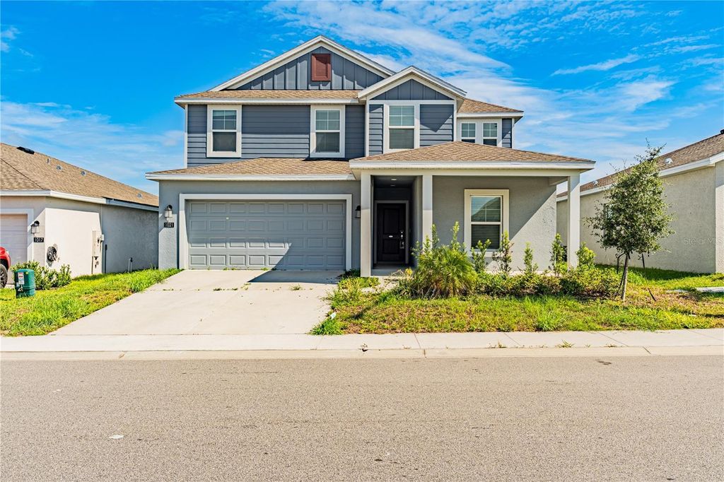 Photo of 1021 Waterfall Boulevard, Davenport, FL 33837 (MLS # O6351299)