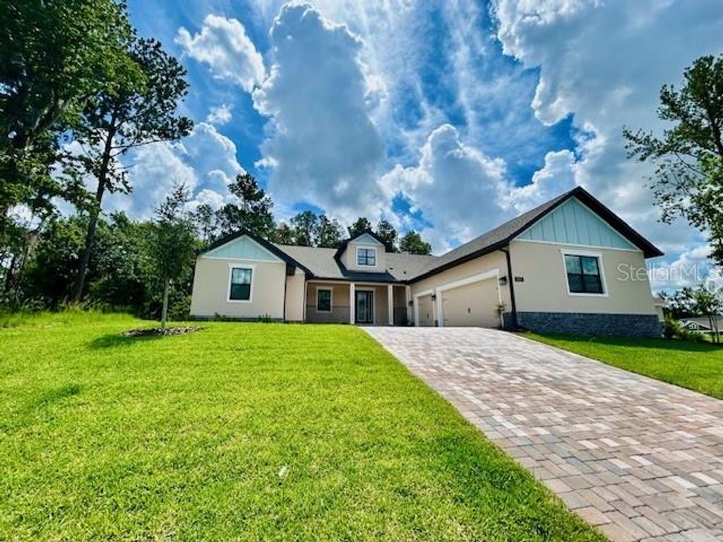 Photo of 4800 Hickory Oak Drive, Brooksville, FL 34601 (MLS # TB8403374)