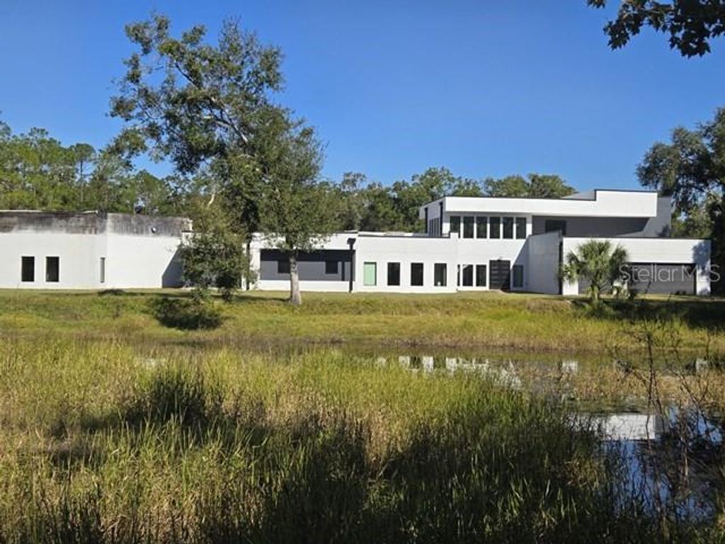 Photo of 2518 Sunset Lane, Lutz, FL 33559 (MLS # TB8449174)