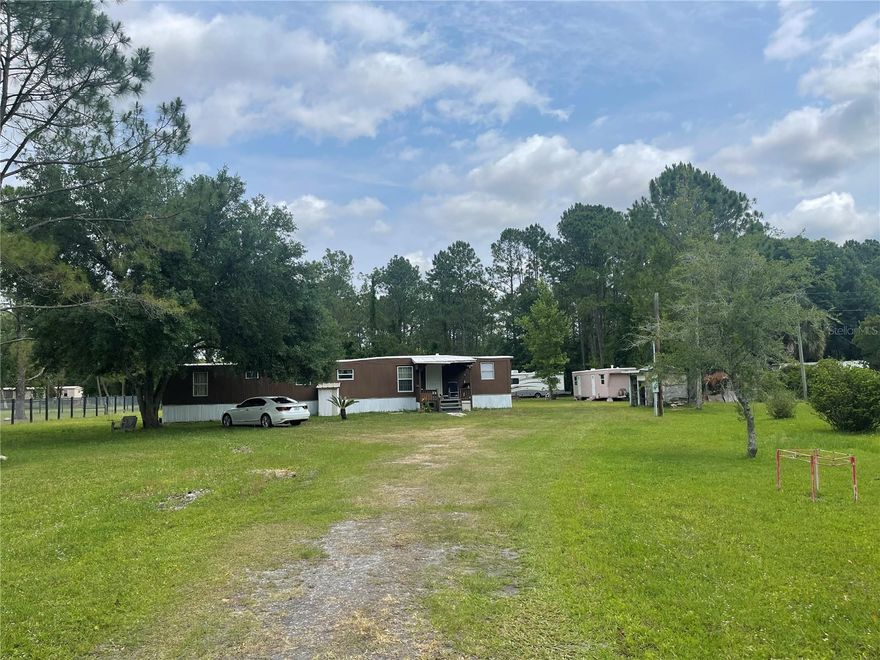 Wonderful Opportunity to Live in the County on a Cleared 1.136. Acres in Beautiful Bunnell, Florida, Only 15 Minutes to Flagler Beach! The Mobile Home is Newly Renovated and Move-In Ready and Features 3 Bedrooms. & 1.5 Baths. Come Live in this Beautiful Setting, at an Affordable Price! Storage Shed & a Nice Chicken Coop is Included, other Animals Welcome!