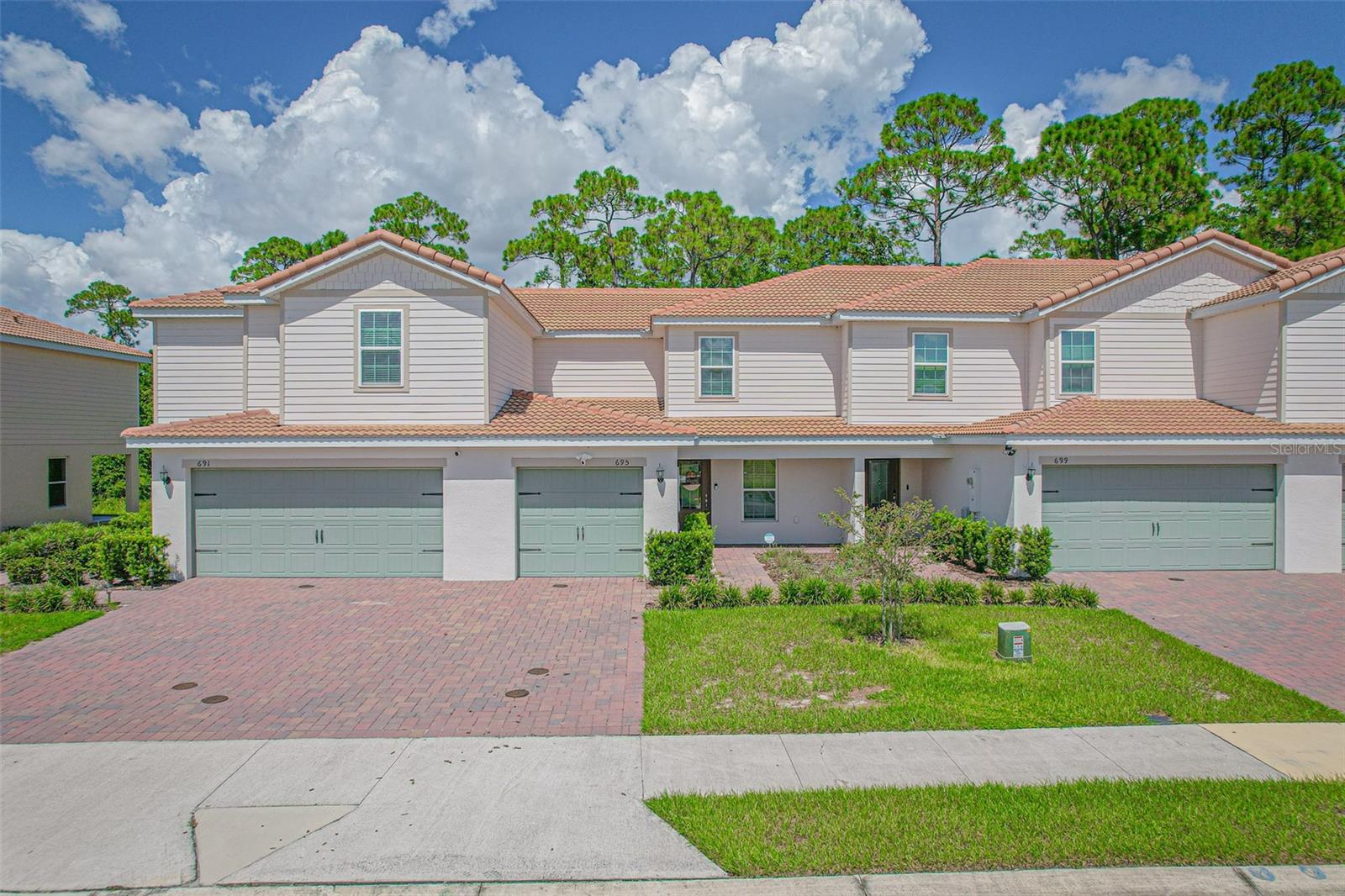 Welcome to 695 Bayleaf Drive, Imagine walking into a charming two-bedroom, two-and-a-half-bath townhouse nestled in the heart of Poinciana, Florida. Step inside to discover a warm and inviting living space. The open floor plan with luxury vinyl plank flooring extends gracefully through the living room, kitchen, and bathrooms, offering both durability and style, the large windows offering lots of natural sunlight to warm your home. The bedrooms provide a cozy retreat with soft carpeting underfoot, making them perfect sanctuaries at the end of the day.
This home is move-in ready with all appliances included, plus the washer and dryer will remain for the new owners' convenience. Outside your door, you'll enjoy a friendly community atmosphere complete with a community pool, a playground, and tennis courts for your leisure. The nature preserve in the backyard offers no back neighbors other than the quiet sounds of wildlife.
The friendly HOA covers your cable internet, lawn maintenance and painting of the home every 10 years.
If you're seeking a blend of comfort and community, this townhouse on Bayleaf Drive is ready to welcome you home. Schedule a showing today.
All information provided is deemed reliable. All information should be verified by buyer.