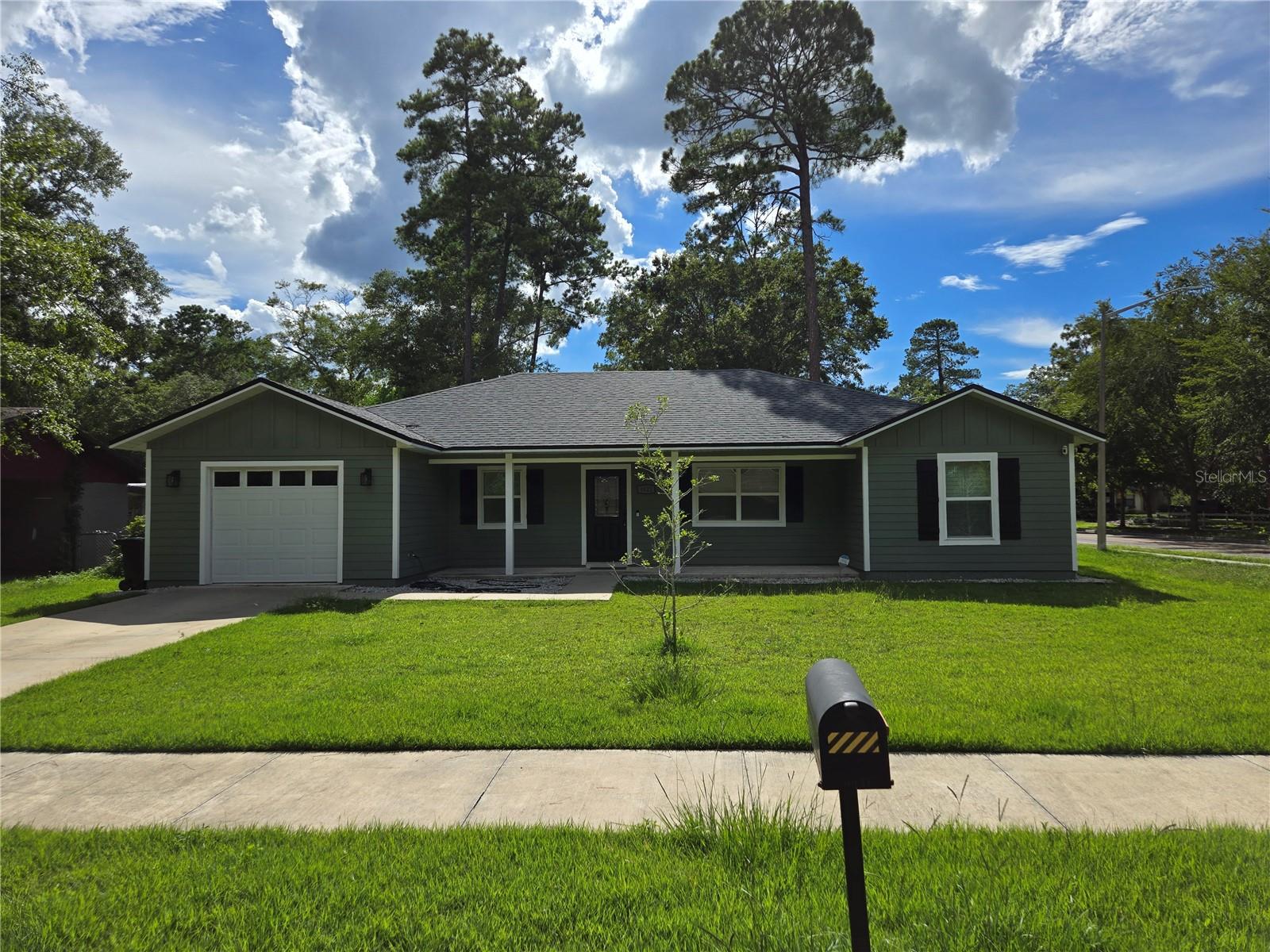 Welcome to this charming 3-bedroom, 2-bathroom home, perfectly situated in a quiet Gainesville neighborhood and just a short walk from Norton Elementary School.
Step inside and discover an inviting open-concept living space with cathedral ceilings and elegant, high-quality vinyl plank flooring throughout. The kitchen is a true highlight, featuring granite countertops, stainless steel appliances, and ample cabinet space. It seamlessly connects to a separate dining room, perfect for family meals or entertaining.
The thoughtful split floor plan ensures privacy, with the spacious primary suite located on one side of the home, complete with an ensuite bathroom. The two additional bedrooms and a second full bath are nestled down a hallway on the opposite side.
Enjoy the outdoors in the large, fully fenced backyard, ideal for pets, play, or relaxing on a sunny afternoon. A beautiful front patio offers a great spot to enjoy your morning coffee.
This home combines modern upgrades with a comfortable layout in a fantastic location. Don't miss the chance to make it your new home!