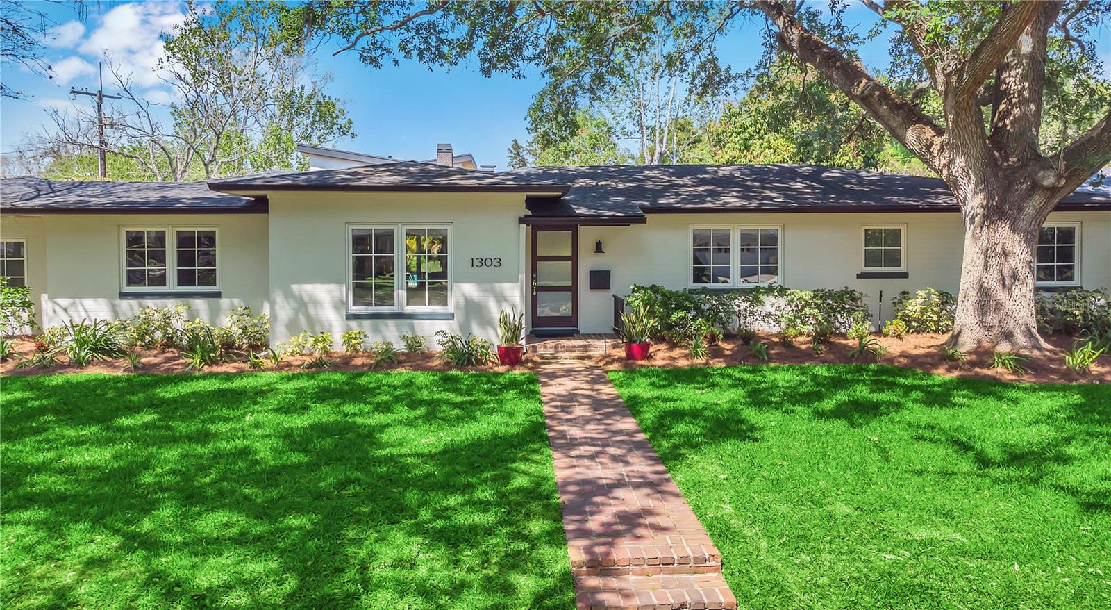This 3 bedroom, 2 bathroom home was completely rebuilt (2016–2017) with high-end finishes. Features include vaulted wood ceilings, a custom chef’s kitchen with quartz counters, oversized island, and cozy banquette seating. Spacious living areas flow to a covered lanai and large brick patio overlooking a resurfaced pool (2020). The primary suite offers a large shower and walk-in closet. Major upgrades include new roof, HVAC, plumbing, windows, and insulation. Set on an oversized, fenced lot with a detached 220 SF building—ideal as a home office, gym or pool house.Located in the highly desirable Beverly Shores neighborhood with tree-lined streets, private access to Mead Gardens, and unbeatable convenience to downtown Winter Park, Mills 50, Ivanhoe Village, AdventHealth, Orlando Science Center, museums, dining, and more. A rare blend of style, comfort, and location!