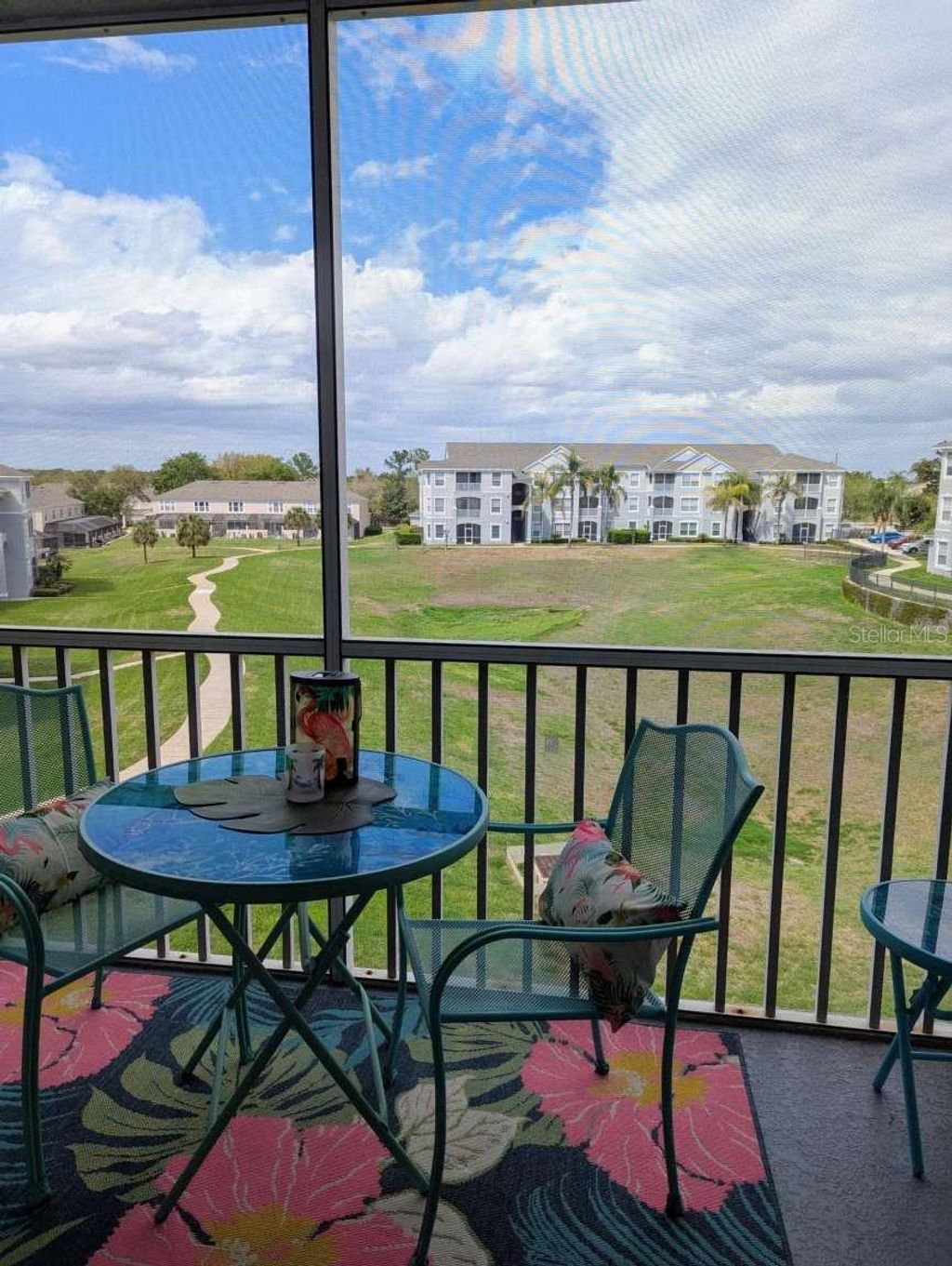 Photo of 8105 Coconut Palm Way #305, Kissimmee, FL 34747 (MLS # TB8487271)