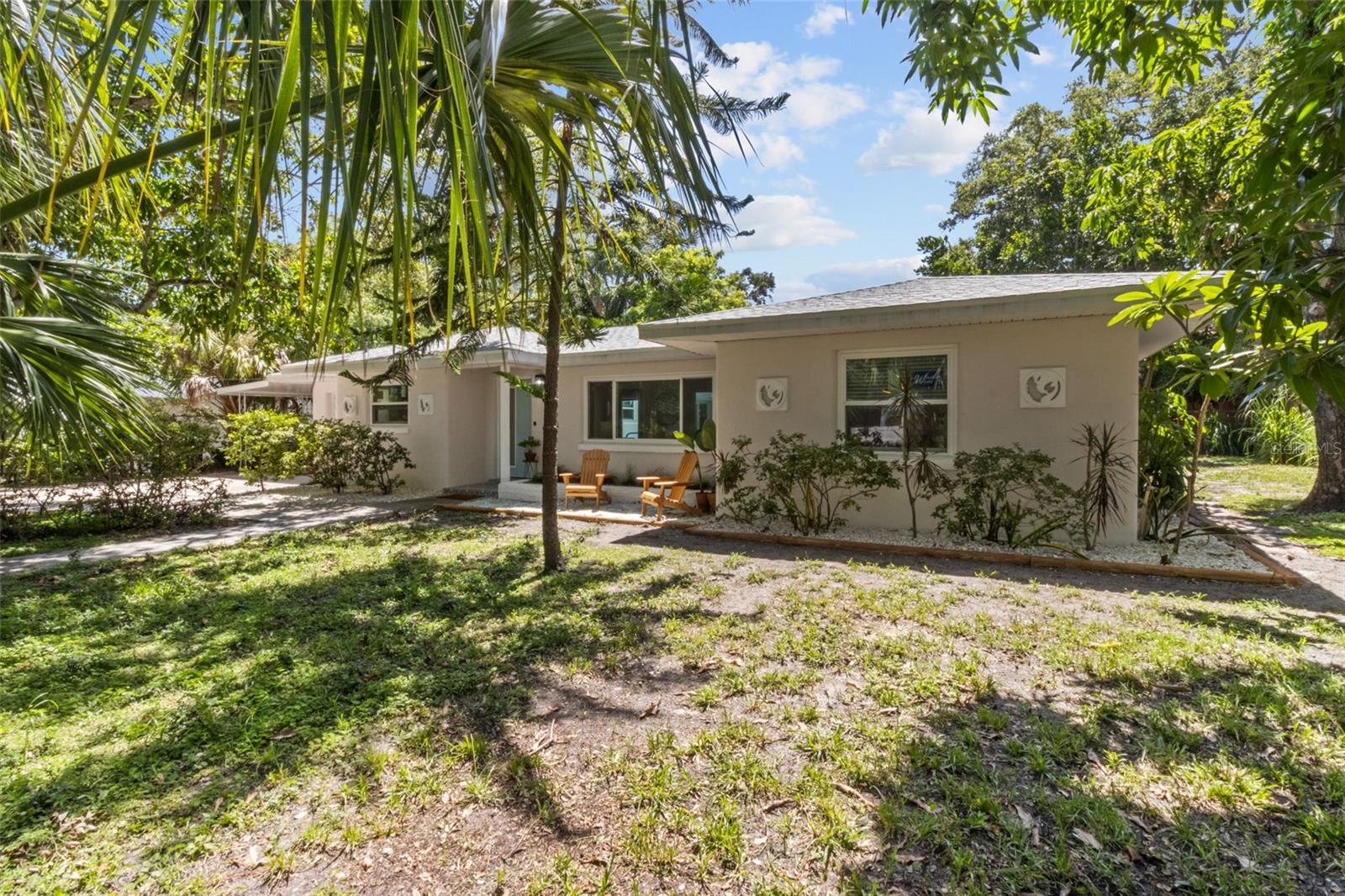 Beautifully Renovated Coastal Chic Retreat with Pool and Guest House – Just 1.5 Miles from Madeira & Redington Beach!
This stunningly updated coastal chic property offers the perfect blend of style, comfort, and flexibility. Located on a serene, tree-lined street, this solid block home sits high and dry—unaffected by recent storms—and is just minutes from the sandy shores of Madeira and Redington Beach.
The main residence features 2 bedrooms and 1 bath, while a detached 1 bed, 1 bath guest house provides additional living space for guests, extended family or income potential. Enjoy the refreshing private pool and lush outdoor areas perfect for entertaining or relaxing in the Florida sun.
No detail was overlooked in the renovations. You'll love the brand-new kitchens with granite countertops and stainless steel appliances, along with updated bathrooms, new flooring, and stylish lighting throughout. Major systems have also been modernized with a new roof, new hurricane-impact windows, and a new electrical panel—offering peace of mind and low-maintenance living for years to come.
Additional features include a large carport, generous driveway parking, and ample storage space. Whether you're seeking a smart investment property with short-term rental-friendly zoning, or a home where you can live in one unit and rent the other, this property offers unmatched versatility.
Easy to show – schedule your tour today and fall in love with coastal living!