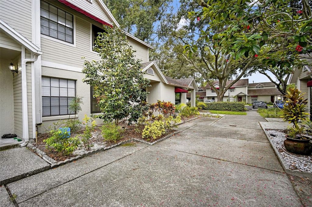 Photo of 8411 Laurelon Place #10-3, Temple Terrace, FL 33637 (MLS # O6342685)