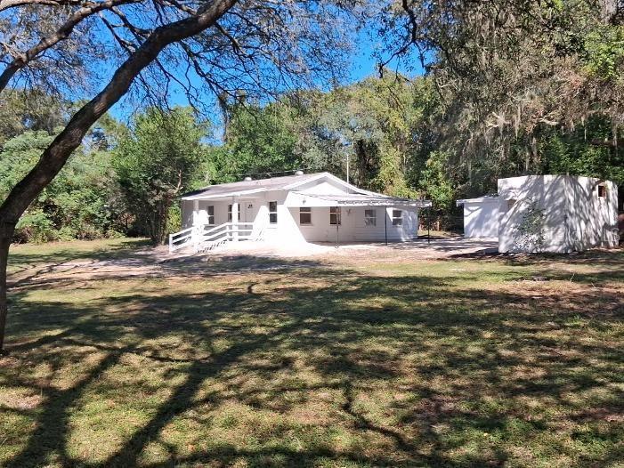 Photo of 40400 Sunset Drive, Eustis, FL 32736 (MLS # O6453331)