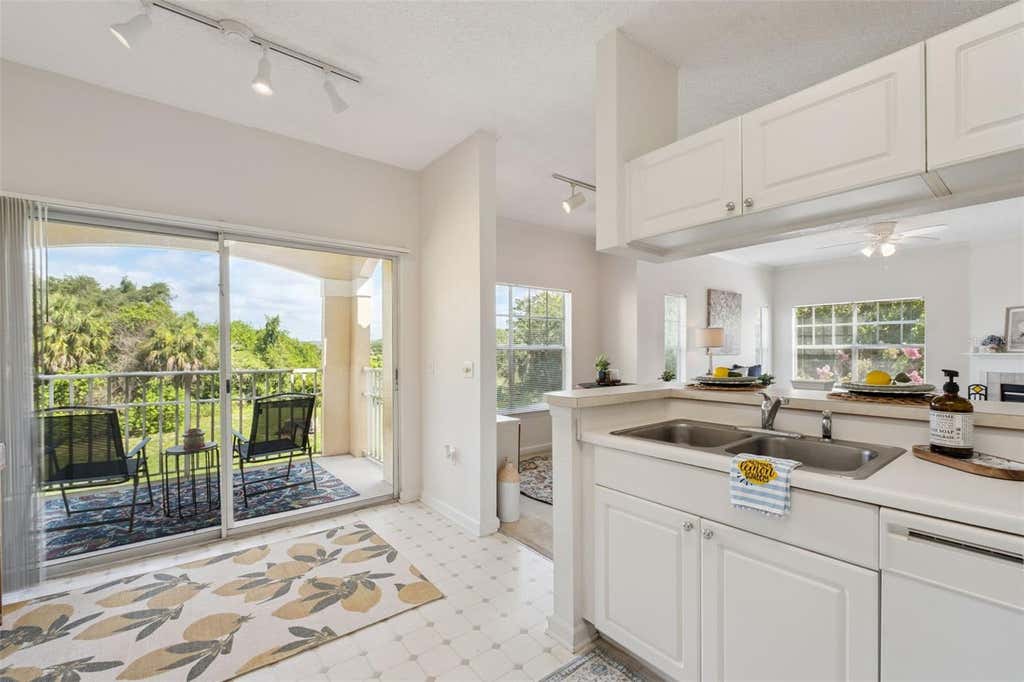 Photo of 426 Arbor Lakes Cir #426, Sanford, FL 32771 (MLS # O6423724)