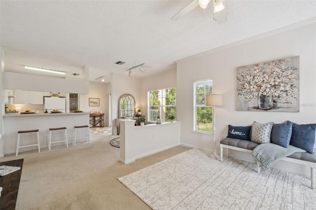 Photo of 426 Arbor Lakes Cir #426, Sanford, FL 32771 (MLS # O6423724)