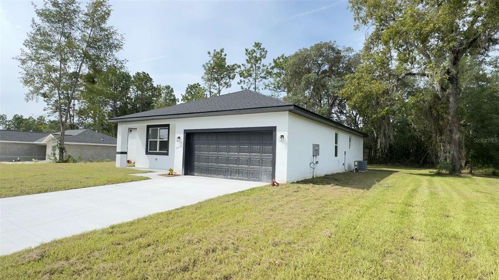 Photo of 7914 N Omega Way, Citrus Springs, FL 34434 (MLS # O6397586)